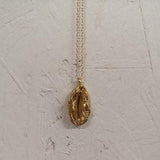 Gold Vagina pendant created using the T.I.Y KIT cast in recycled silver and gold plated