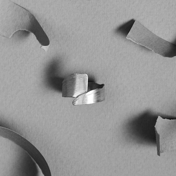 Torn Band by Laura Nelson - contemporary silver jewellery exploring processes. Designed and made in the UK.